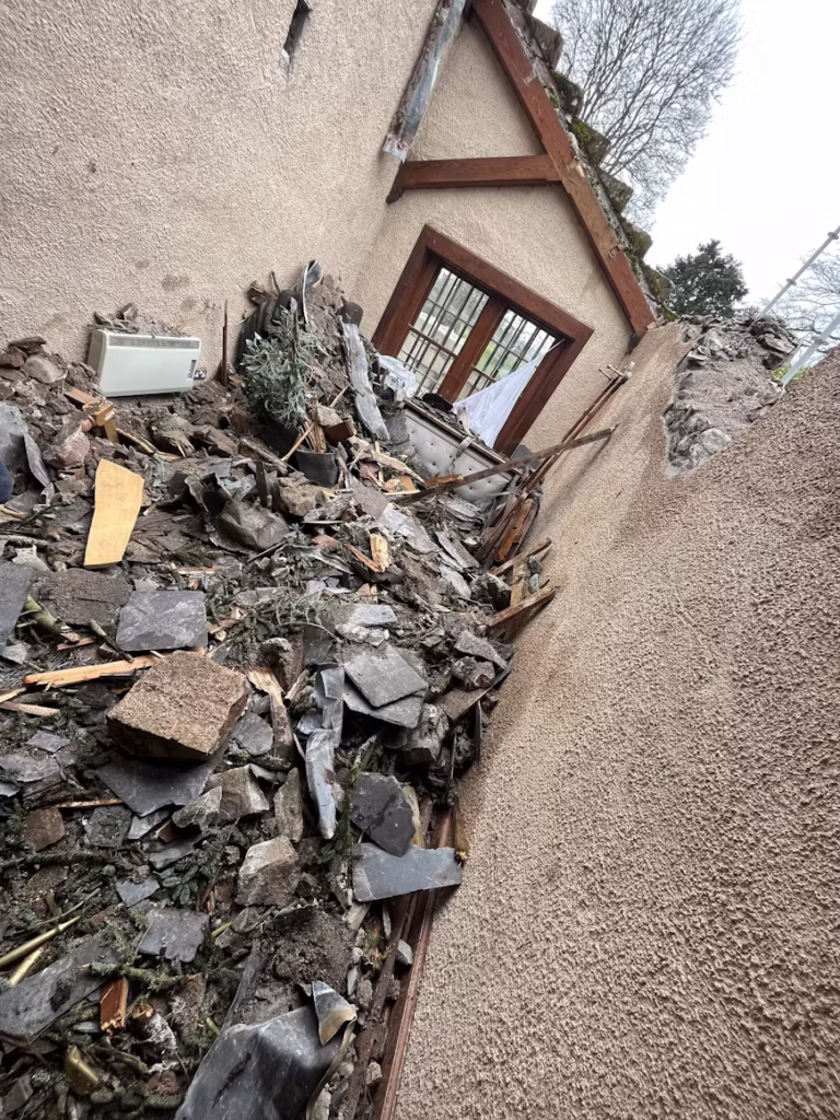 Bowling alley with roof collapsed showing cushion in need of conservation treatment